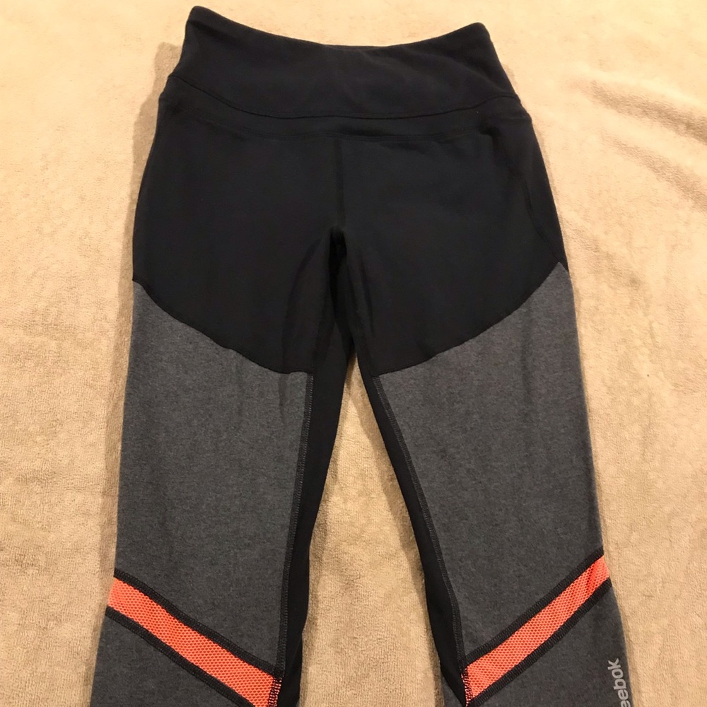 Athletic capris, just below the knee